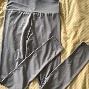 Grey/silver leggings size Small